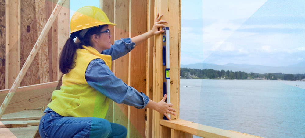 Woman measuring on construction site